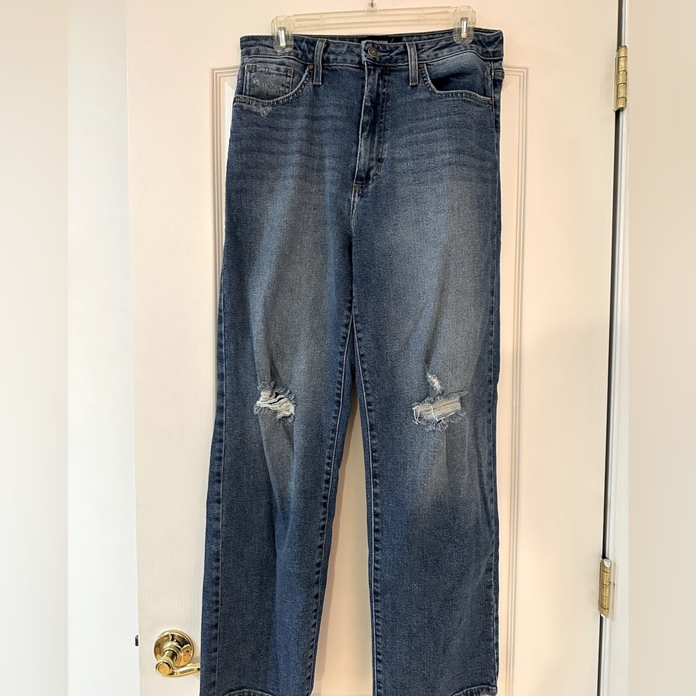 High rise flare ripped jeans. Not cropped.
